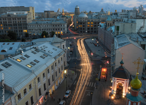 View from Church of St. Nicholas in Klennikah to evening Maroseyka street in Moscow photo