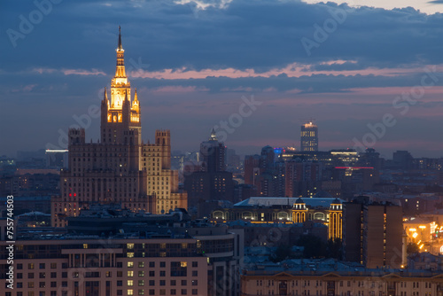 Tall residential building on square Kudrinskaya (Stalin skyscraper) at night in Moscow, Russia © Pavel Losevsky