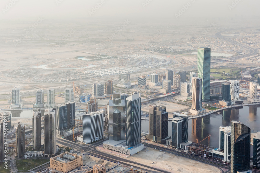 Business Bay, residential area and desert far away in Dubai, United Arab Emirates