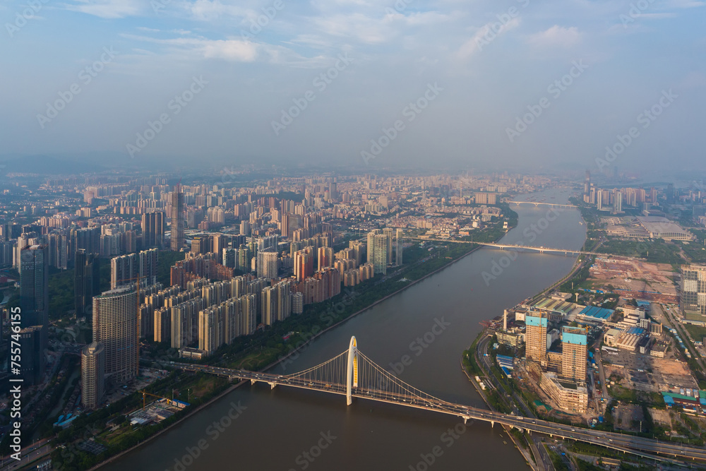 Fototapeta premium Bridges ans river at sunny summer day, Guangzhou, China, aerial view