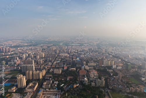 Residential area at sunny summer day, Guangzhou, China, aerial view © Pavel Losevsky