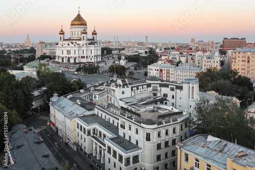 Christ the Savior Cathedral and roofs of buildings at evening in Moscow photo