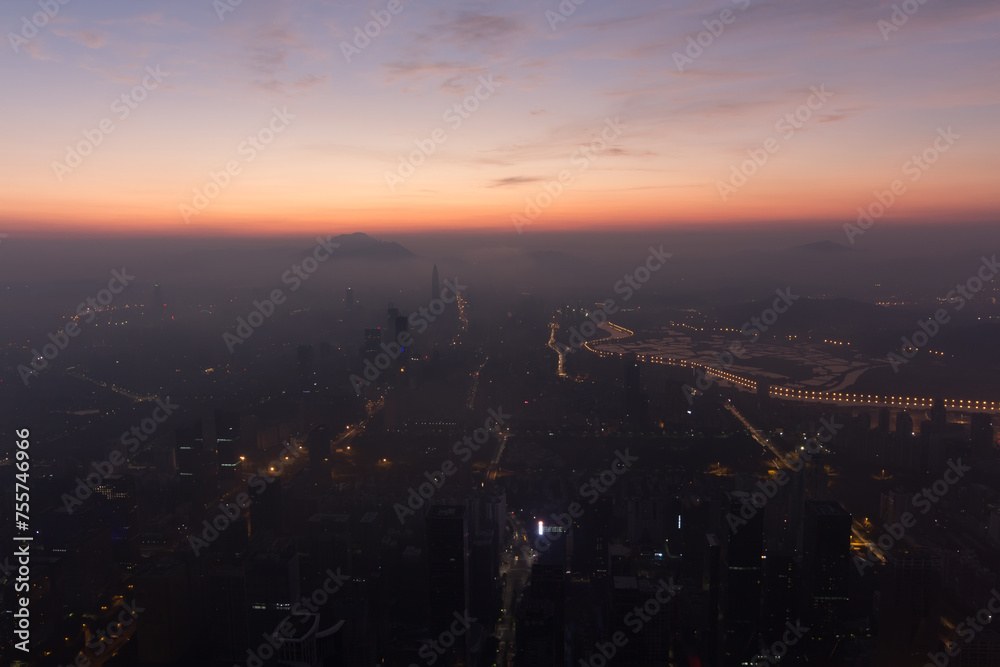 Naklejka premium Sunrise and cityscape, view from Ping An Finance Centre, Shenzhen, China