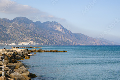 Rocky coast on the beach in Kardamena resort. Kos island, Greece