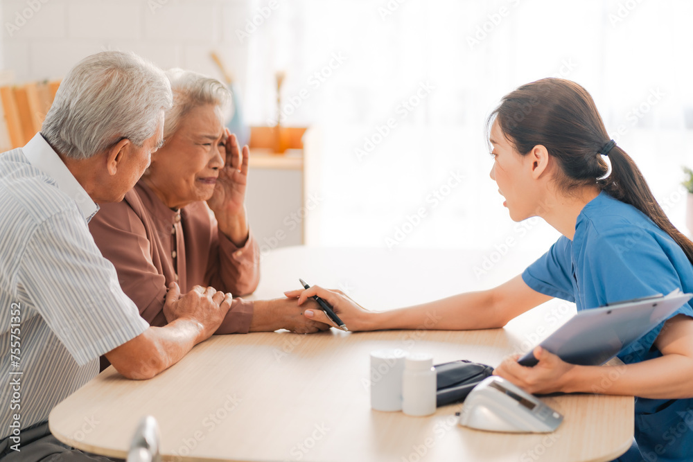 Obraz premium nursing home assistance in health insurance business concept, asian woman doctor or nurse caregiver support health care to elderly senior patient person, caretaker in medicals care recovery service