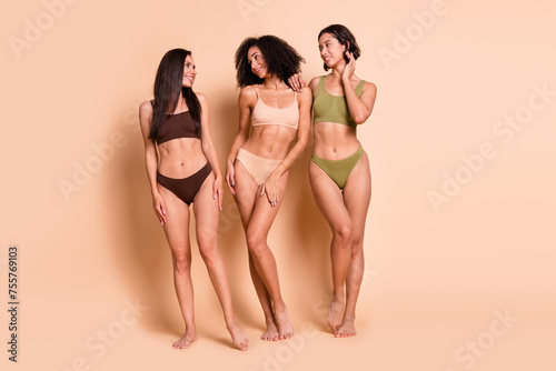 Studio no retouch photo of pretty stunning ladies dressed lingerie accepting imperfect bodies isolated pastel color background