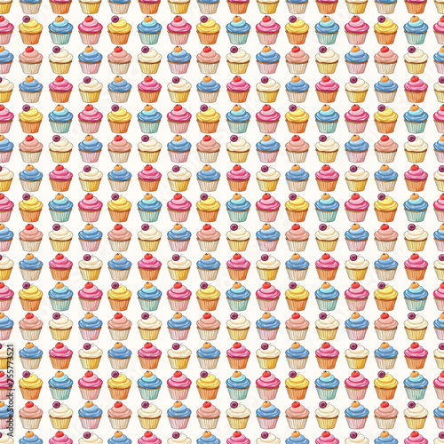 Seamless repeating decorative pattern of colorful cupcakes. 