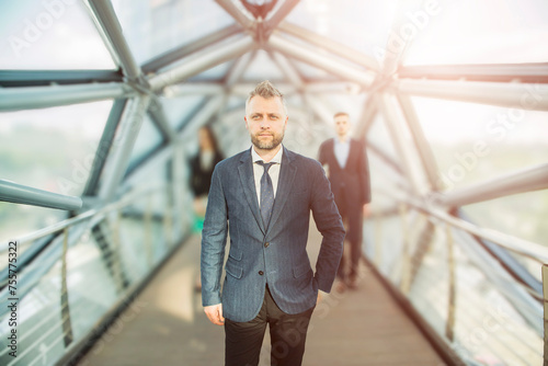 portrait of a successful businessman man on the background of a modern office building © de Art