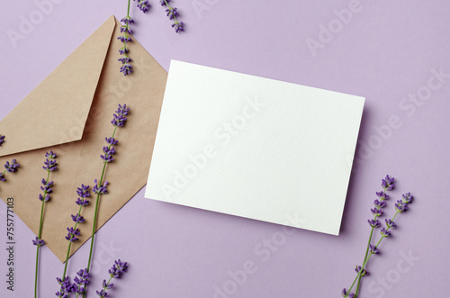Invitation or greeting card mockup with envelope and lavender flowers