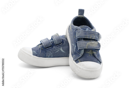 Unbranded fashion stylish walking kid shoes or baby velcro sneakers isolated on white background.