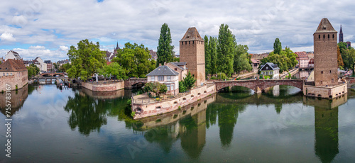 Panoramic view on The Ponts Couverts in Strasbourg with blue cloudy sky. France.