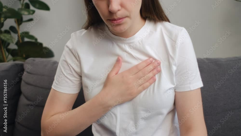 Close up of young woman have symptom gastroesophageal, esophageal
