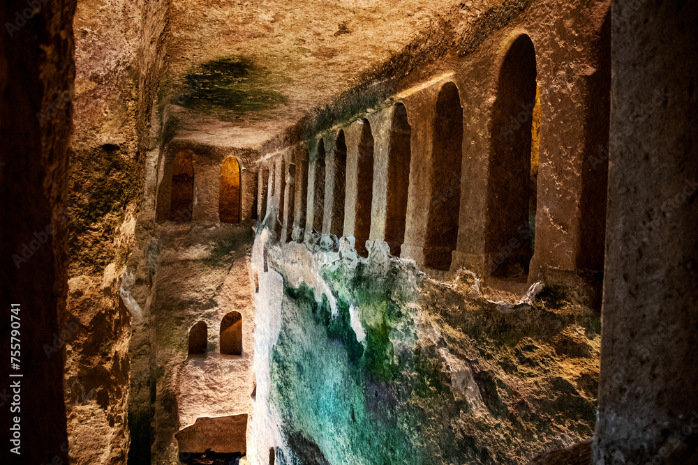 Ταπετσαρία Arches of subterranean monolithic church of Saint-Jean carved into a cliff, largest underground church in Europe