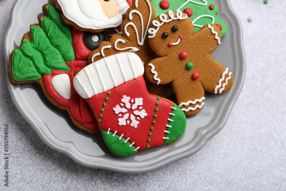 Tasty homemade Christmas cookies on light grey table, top view