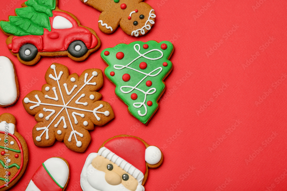 Different tasty Christmas cookies on red background, flat lay. Space for text
