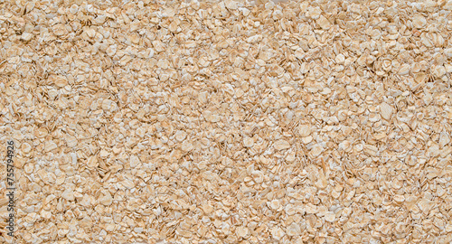 Foto Uncooked oat flakes
