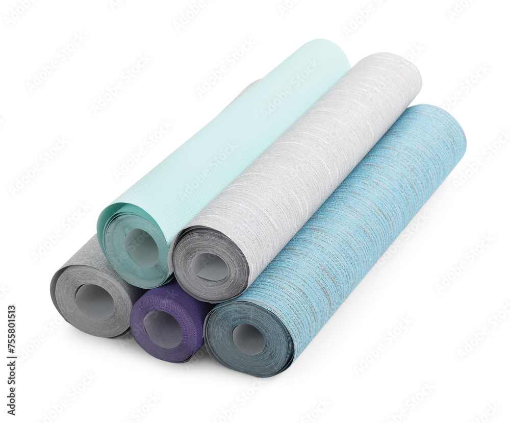 Many different wallpaper rolls isolated on white Many different wallpaper rolls isolated on white