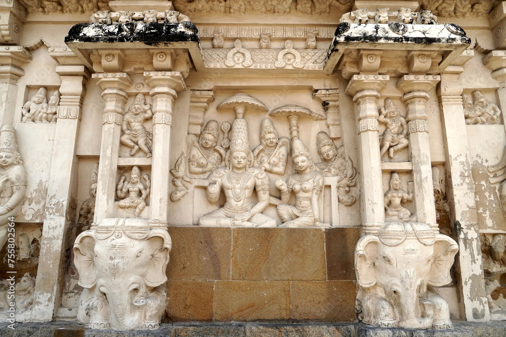 Hindu God and Animal sandstone sculptures in ancient hindu temple walls. Historical statues of idols in Kanchi Kailasanathar temple in Kanchipuram, Tamilnadu.