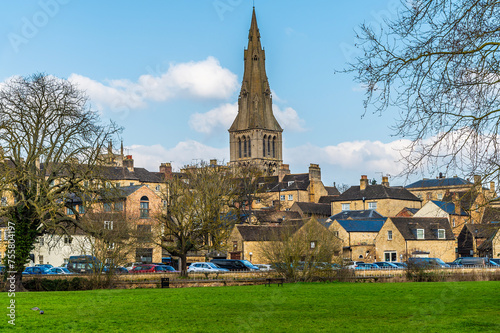 A view across the River Welland towards Saint Marys Church in the town of Stamford, Lincolnshire, UK in winter photo