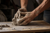 Male sculptor hands kneading clay on table. Generative AI