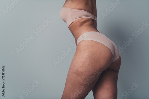 Unretouched cropped photo of woman wearing lingerie pants after skincare hygiene new anti rejuvenation thrapy for feel self body confidence photo