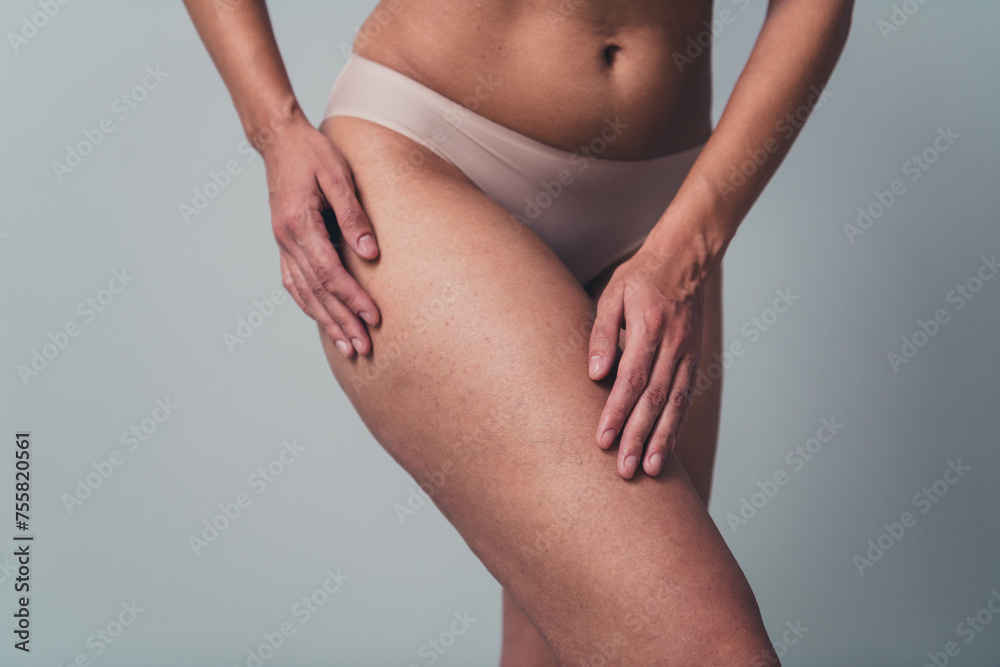 Cropped unretouched photo of woman in lingerie have depilation treatment touch soft hips skin feel body confidence