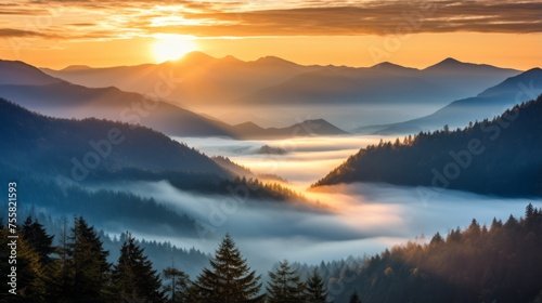 A radiant sunrise over a misty mountain