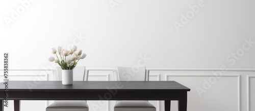 Single dining table on a white backdrop. © Vusal