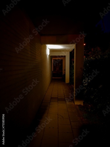 Dimly lit motel alleyway
