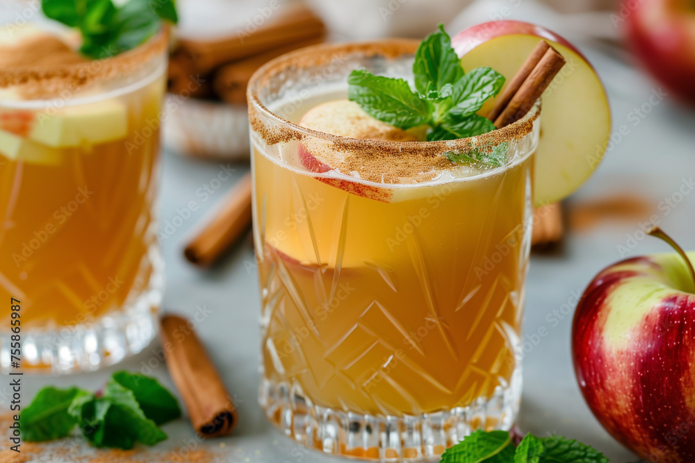 Close-Up Festive Apple Cider Beverage with Cinnamon. Close-up of apple cider with cinnamon and apples, perfect for festive occasions.
