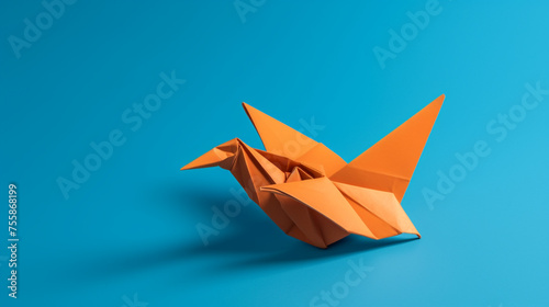 orange origami bird flying on a blue background   reated with Generative Ai