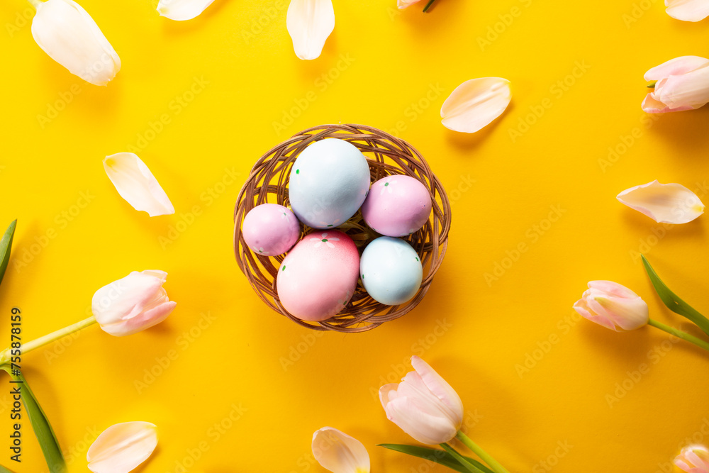  Easter eggs on yellow background. Greetings card, Happy Easters. Flat lay ,top view