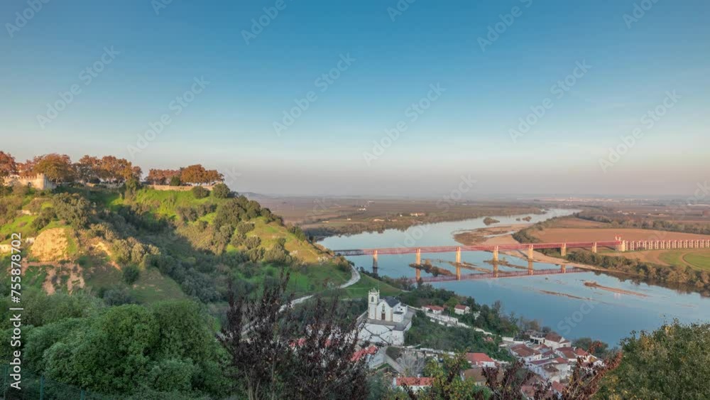 Panorama showing the Castle of Almourol on hill in Santarem aerial timelapse. A medieval castle atop the islet of Almourol in the middle of the Tagus River with bridge over it. Portugal Panorama showing the Castle of Almourol on hill in Santarem aerial timelapse. A medieval castle atop the islet of Almourol in the middle of the Tagus River with bridge over it. Portugal