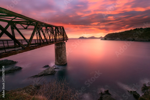Sunrise from Dicido beach, Mioño, Castro Urdiales, with a cloudy sky with dramatic tones and warm colors photo