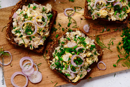 Forshmak from herring on slices of rye bread.top veiw photo