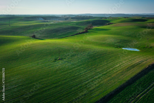 Aerial landscape of the green fields in northern Poland at spring time. © Patryk Kosmider