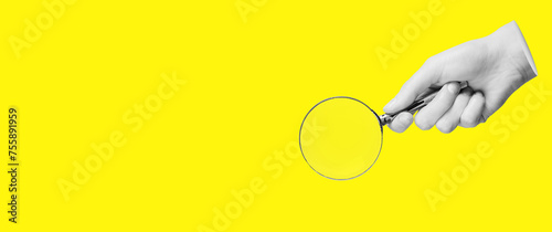Magnifying glass, lens in hand for search, find, study, yellow banner background with copy space © valiantsin
