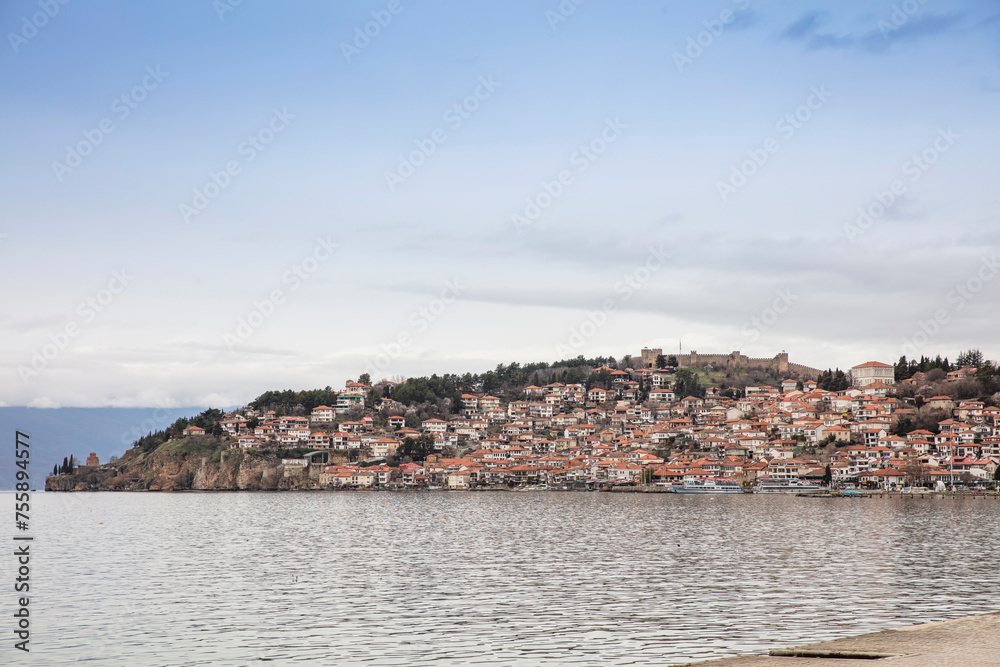 Ohrid old city reflected in Lake Ohrid, UNESCO World Heritage Site, Macedonia, Europe