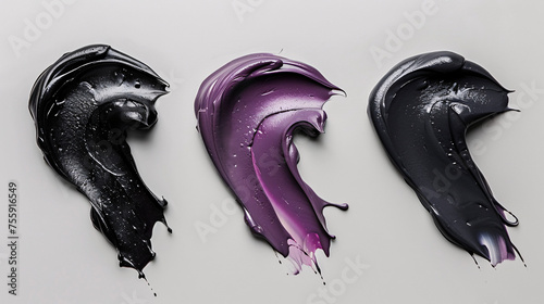 Vibrant paint strokes in black, purple, and grey on a white background photo