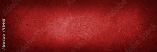 Wide red textured concrete wall background. Dark edges
