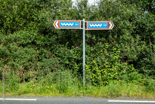 The sign points to a discovery point on the Wild Atlantic Way photo