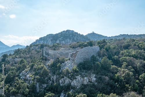 The scenic view of Termessos ancient city and the theater from Güllük Mountain, Antalya, Turkey photo