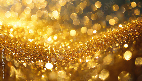 Golden sparkle glitters with bokeh effect and selectieve focus. Festive background with bright gold lights, champagne bubble. Christmas mood concept. Copy space, close up, texture, top view. photo