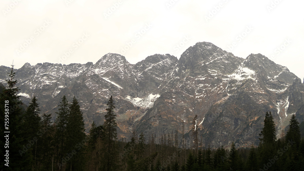 Obraz premium Morskie Oko, or Eye of the Sea, is the largest and fourth deepest lake in the Tatra Mountains in southern Poland. It is located deep in the Tatra National Park, in the Rybi Potok Valley