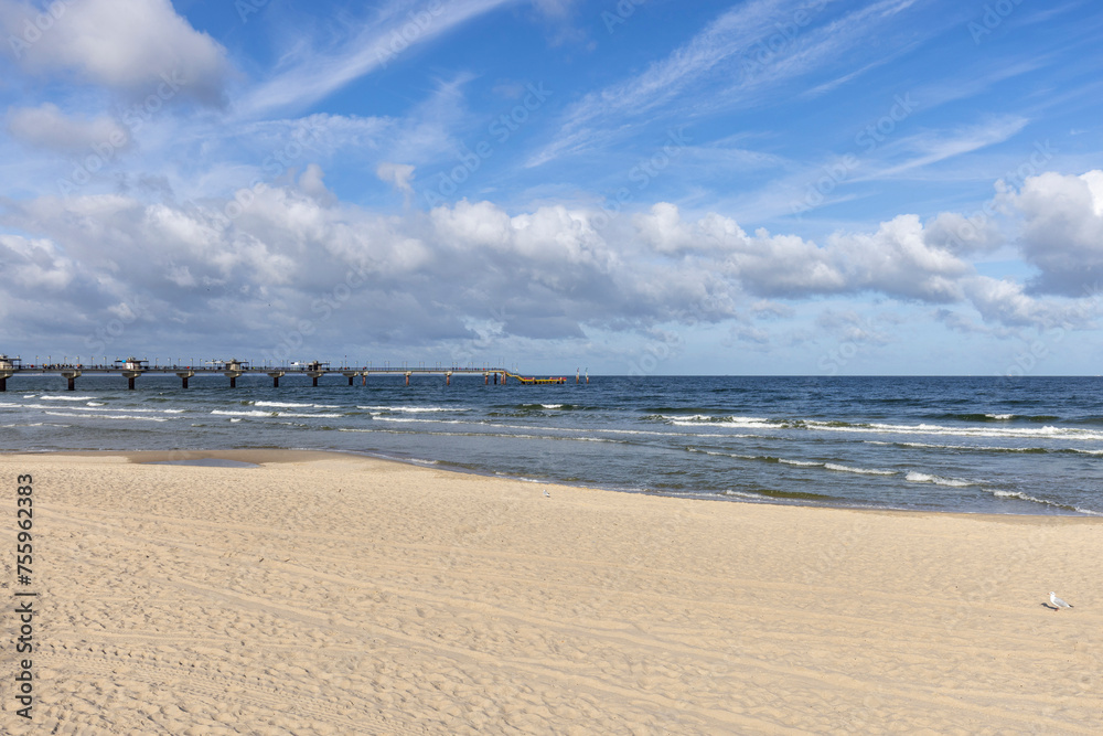 Miedzyzdroje pier, long wooden pier from the beach deep into the Baltic Sea, Miedzyzdroje, Poland Miedzyzdroje pier, long wooden pier from the beach deep into the Baltic Sea, Miedzyzdroje, Poland