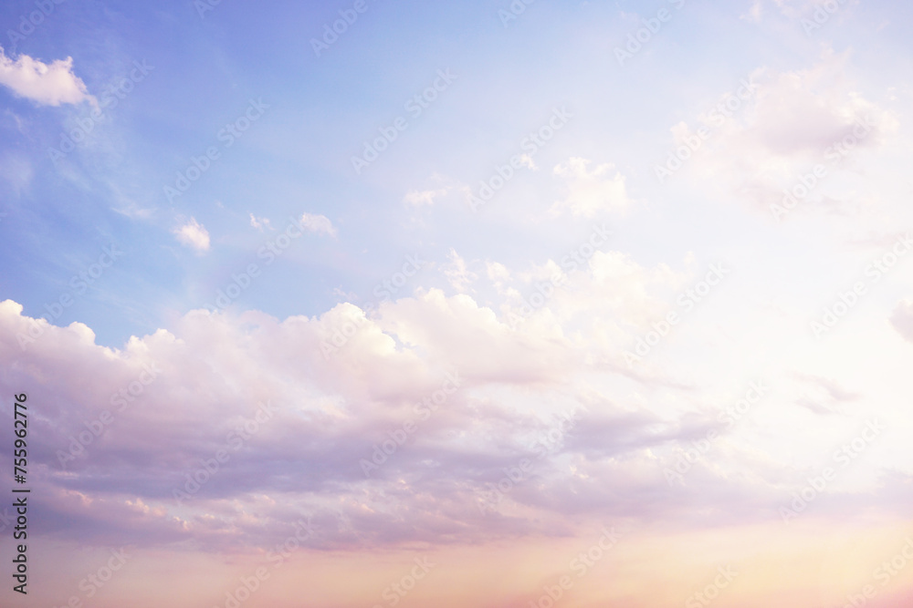 Blue purple lilac orchid pink peach white orange gold yellow cloudy evening sky background. Sunset clouds sun dawn summer. Delicate light pale pastel soft shades. Calm twilight sleep dream fantasy.