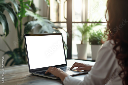 Woman working on her laptop in a home office remote work, mockup