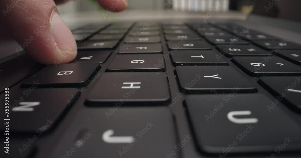Close-up male hands typing email on laptop keyboard, working, internet browsing or searching sitting in the office. Software, apps, modern tech concept Close-up male hands typing email on laptop keyboard, working, internet browsing or searching sitting in the office. Software, apps, modern tech concept