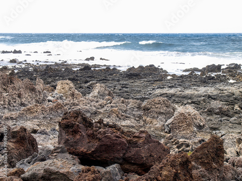 Lanzarote, Spain - June 2, 2018: Caleta del Mojón Blanco, white sand and lava rocks