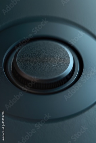 A detailed shot of a button on a blue surface. Perfect for design projects.